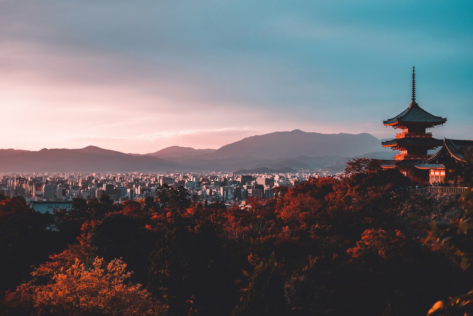 Kyoto temple among autumn foliage, Japan
