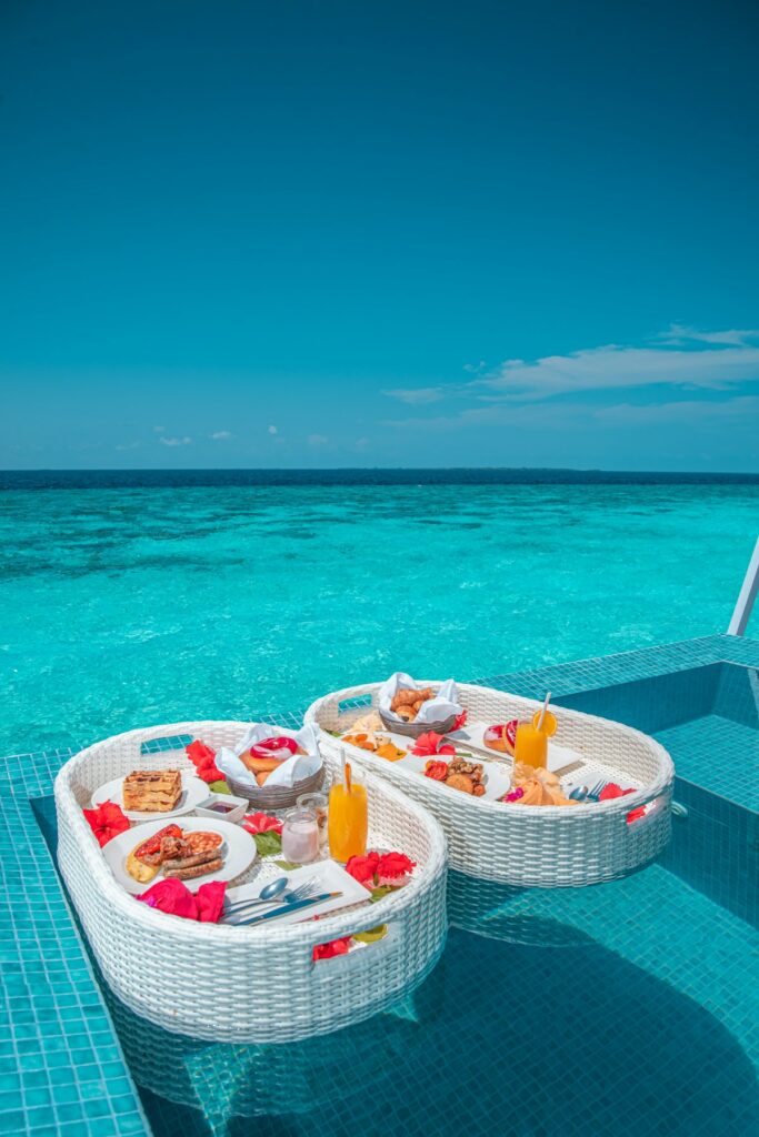 Traditional dhow on the turquoise shallows of a Zanzibar beach