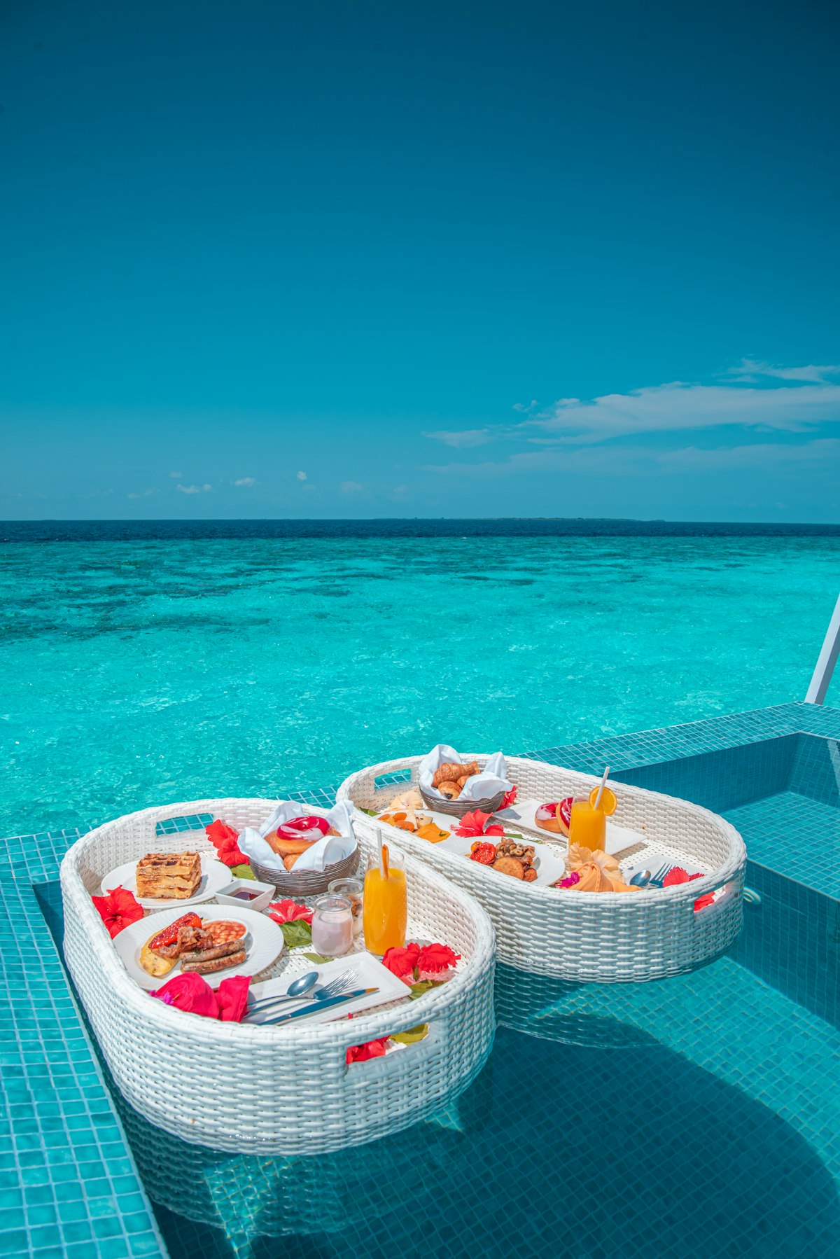 Traditional dhow on the turquoise shallows of a Zanzibar beach